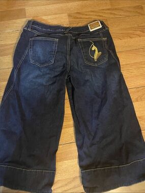 Wide-Leg Dark Blue Jeans with Yellow Embroidered Back Pocket